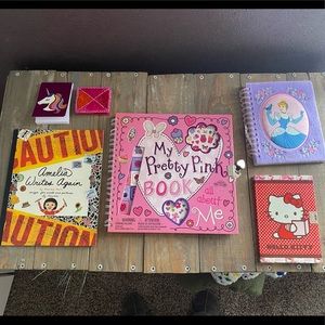 Bundle of journals and American Girl Amelia Writes Again book